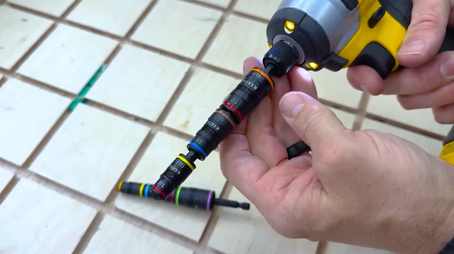 Klein Tools flip socket being flipped on its impact shaft with the other socket sizes stored behind it