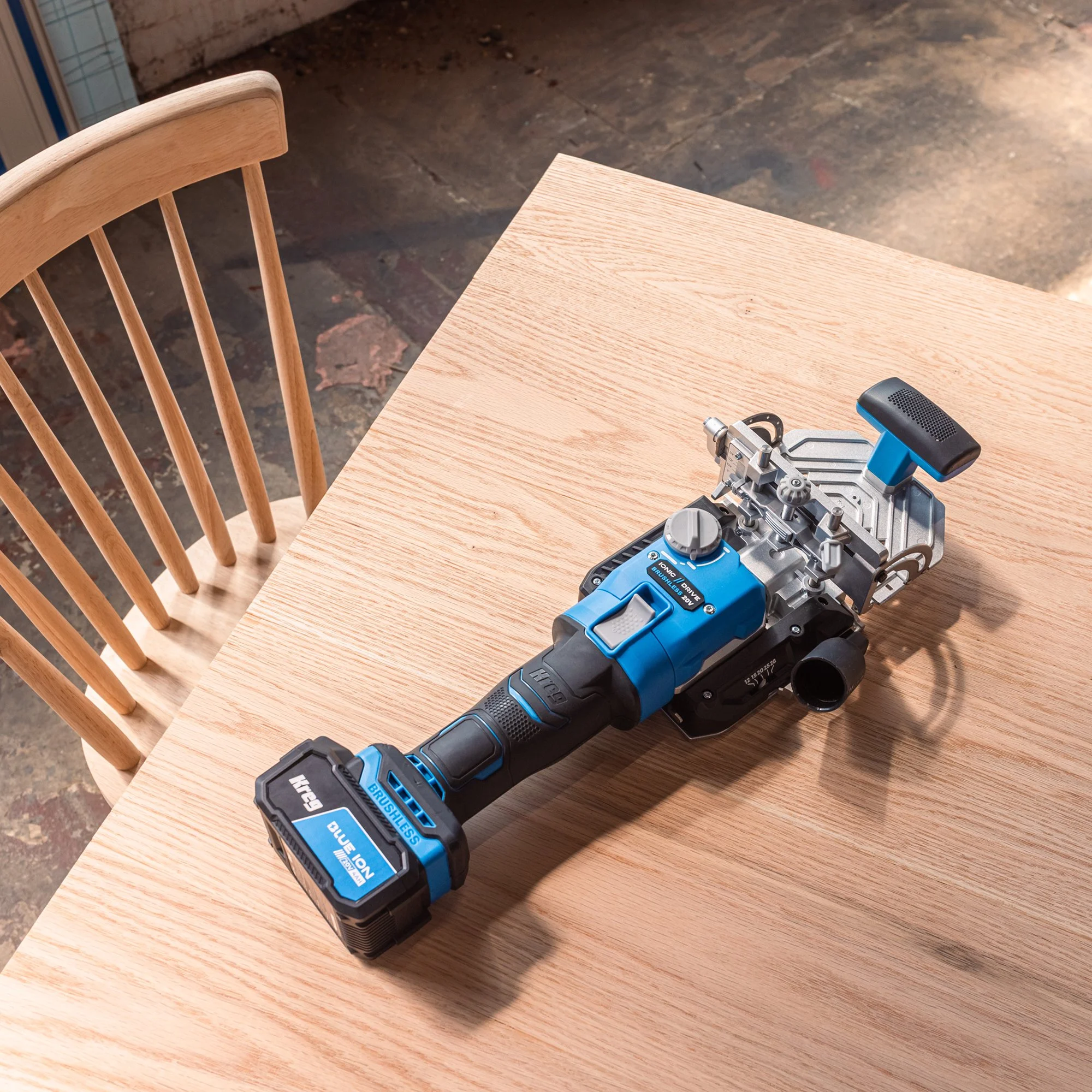 Kreg Edge loose tenon joiner resting on a workshop table