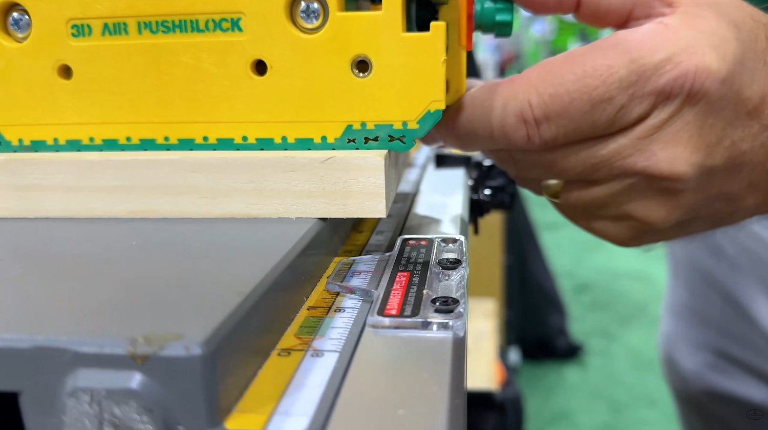 MicroJig GRR-Ripper Air push block with its air heel rolling over the end of a board