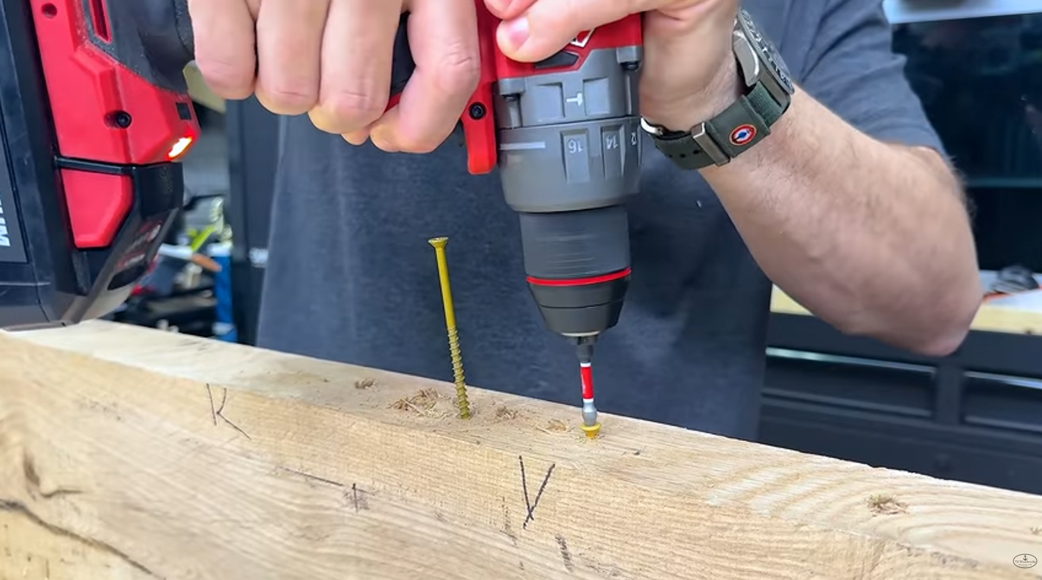 Cordless drill clutch collar showing the numbered torque settings behind the chuck