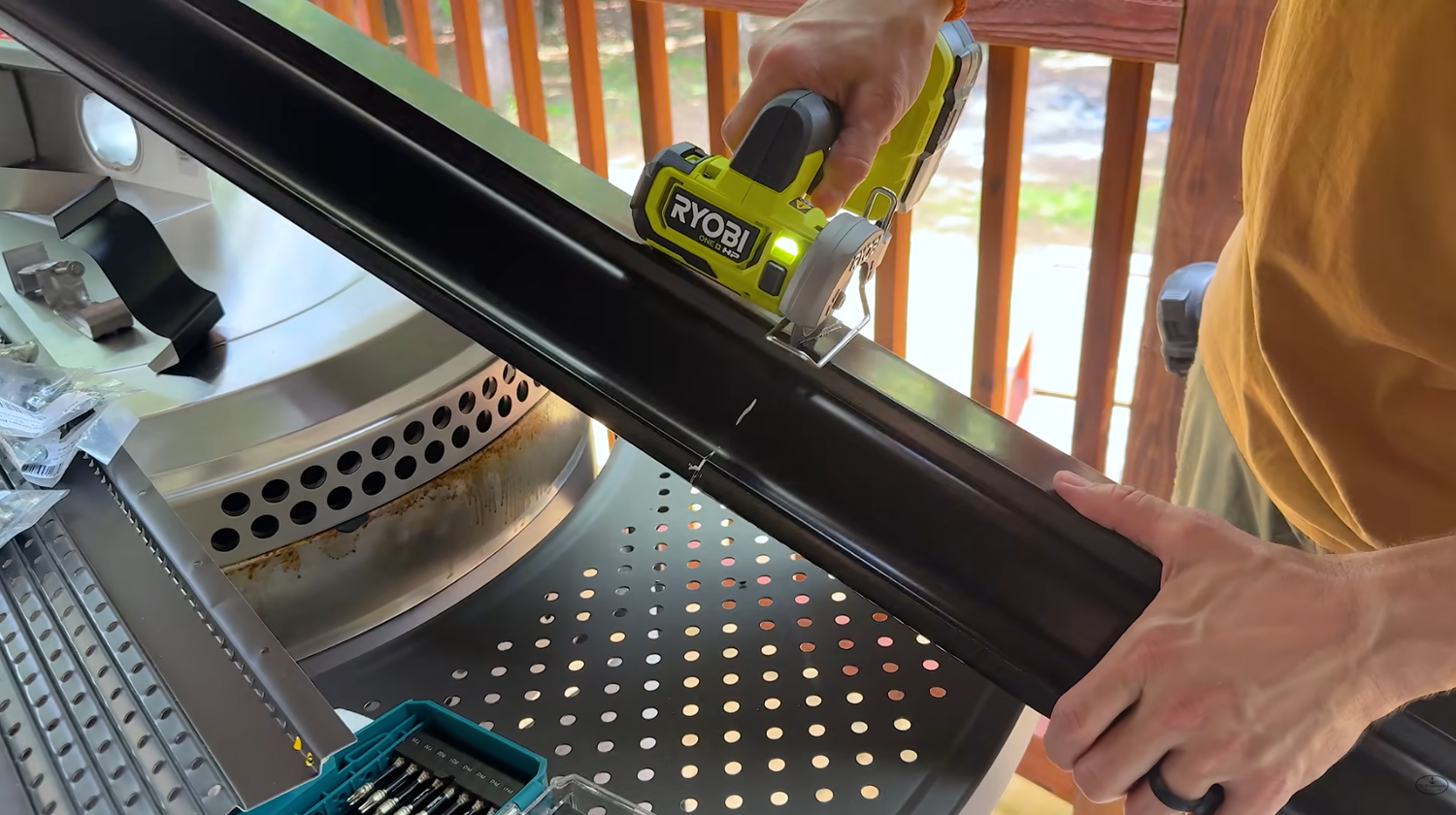 RYOBI 18V ONE+ HP cut-off tool PSBCS02B with the depth guard down and onboard disc storage visible