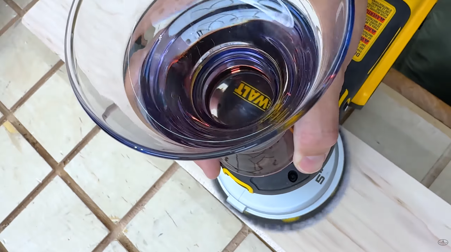 Glass of water vibration test on the DeWALT XR 5 inch and 6 inch cordless random orbit sanders