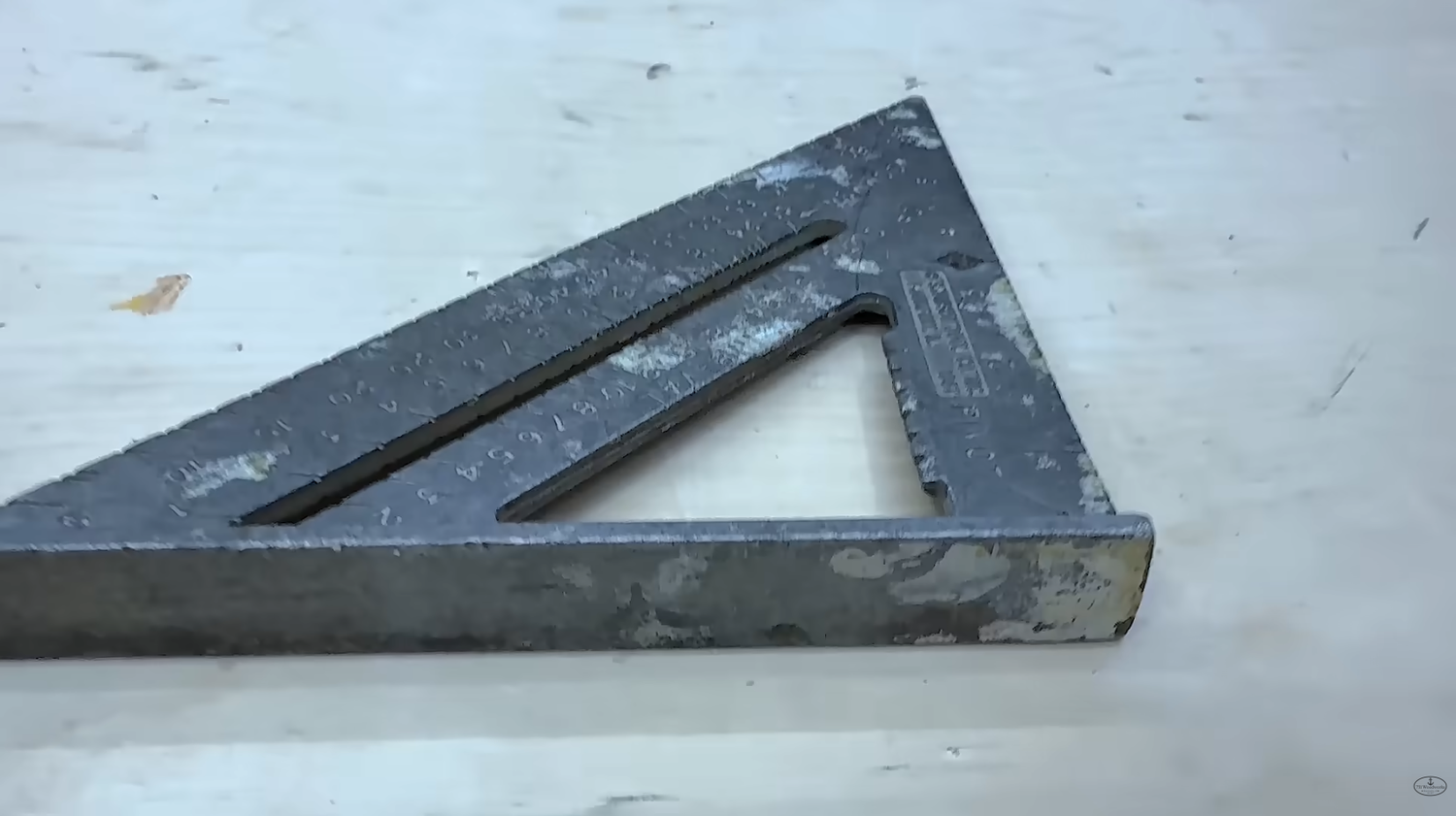 Swanson Speed Square S0101 owned since 1995 showing years of shop wear on the aluminum body
