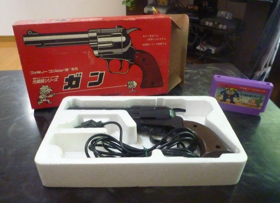 The Famicom revolver in its box tray