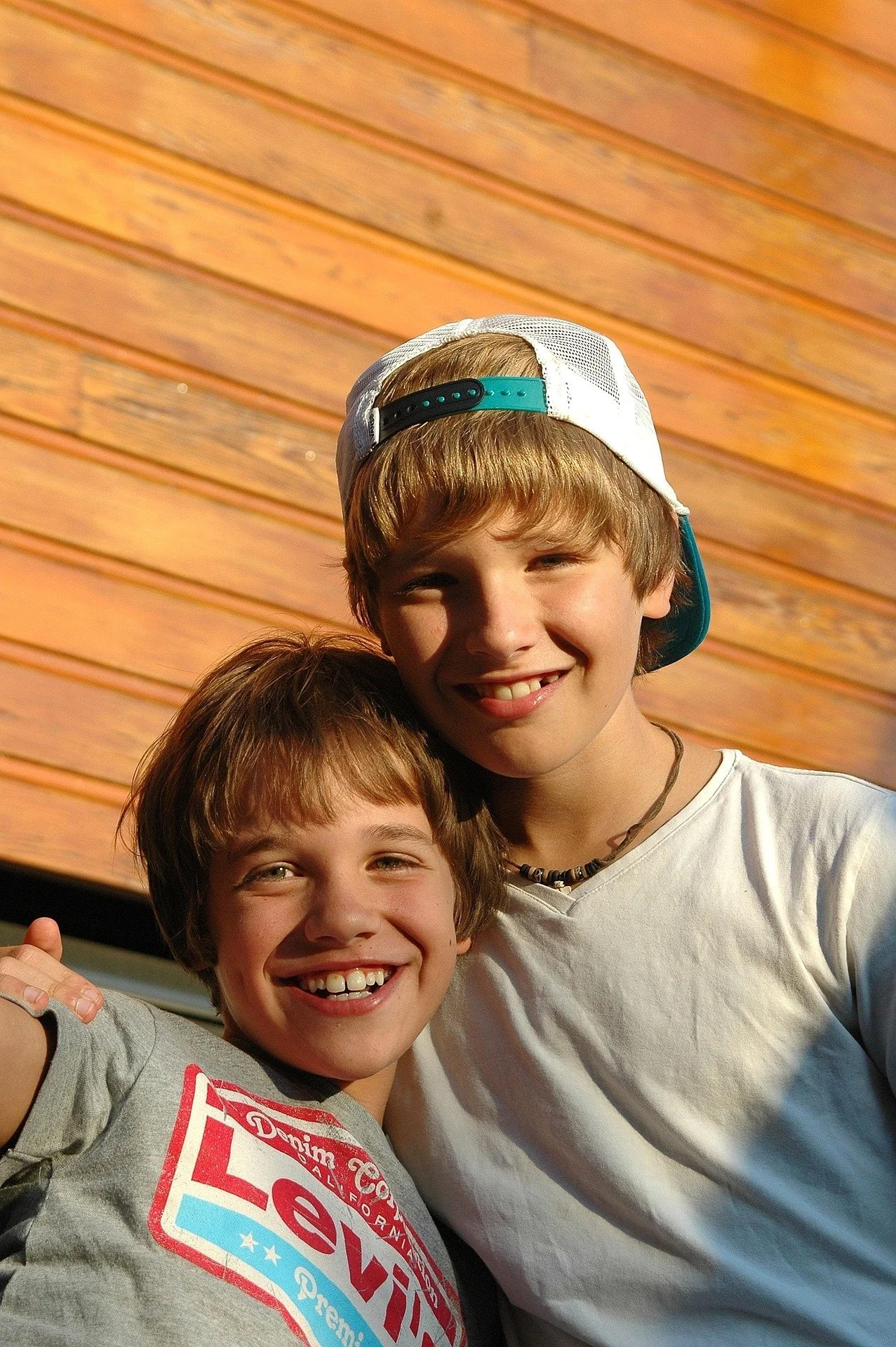 Two kids laughing together