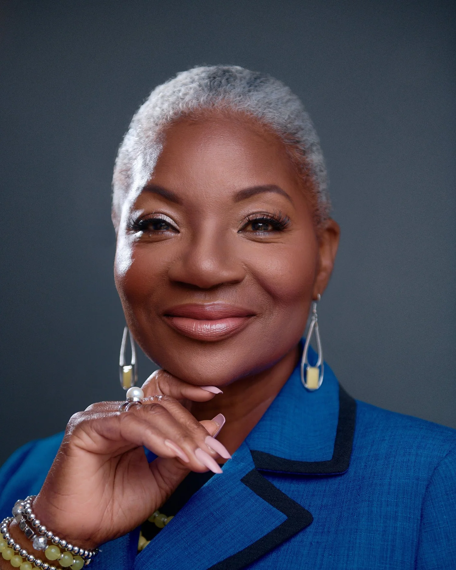 Executive portrait in a blue jacket
