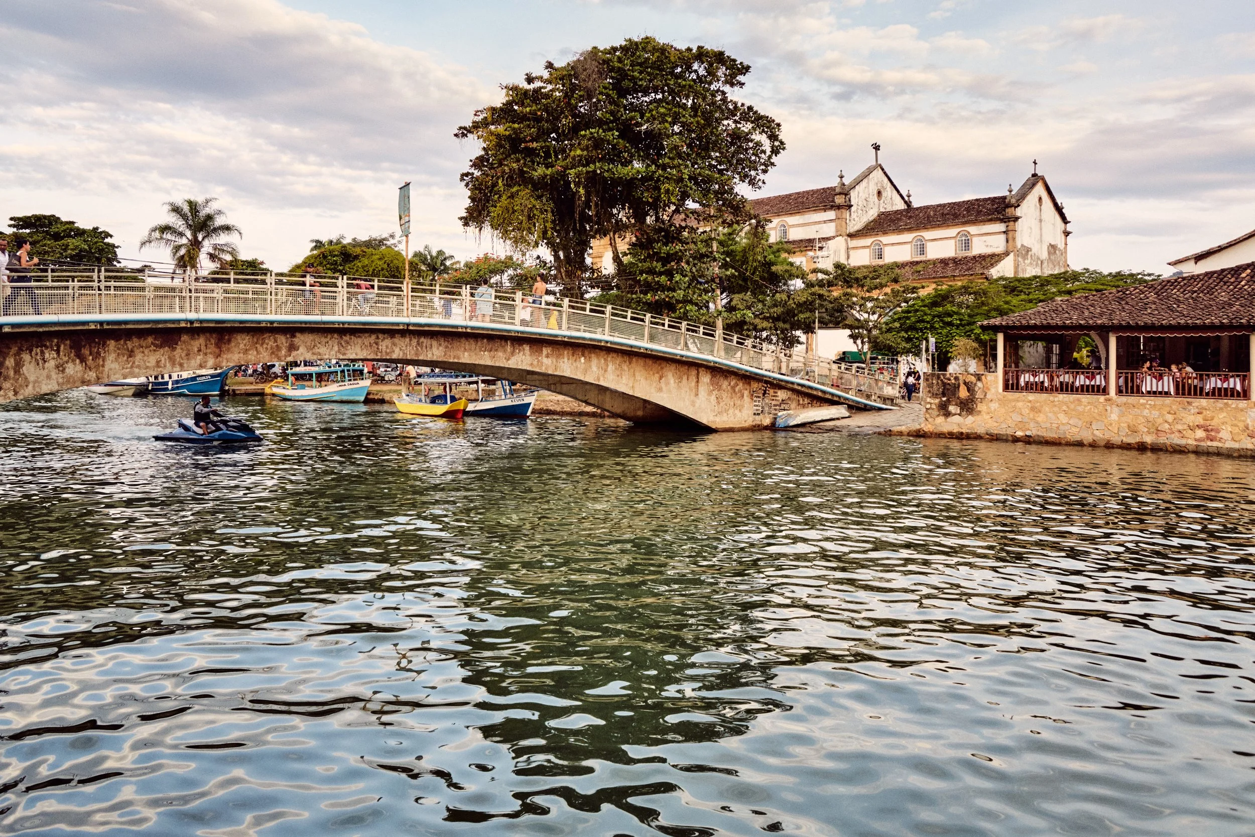 Church, bridge, water and old Paraty facing the coast