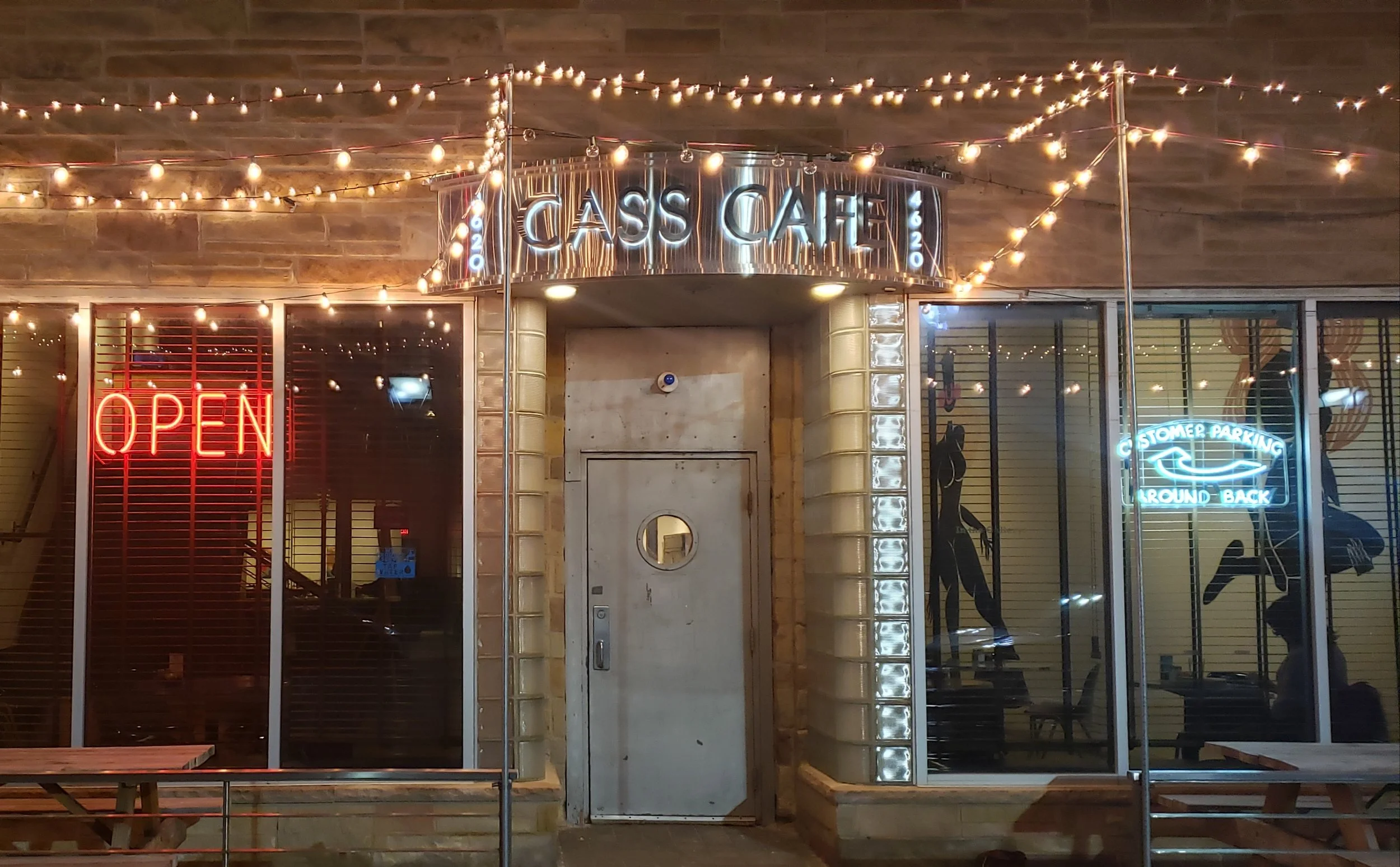 Cass Café open sign at night