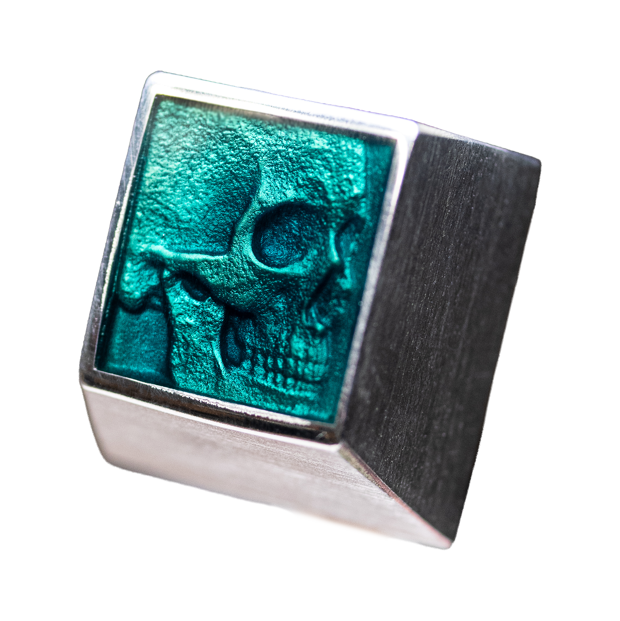 Venom: turquoise skull in a brushed aluminium keycap