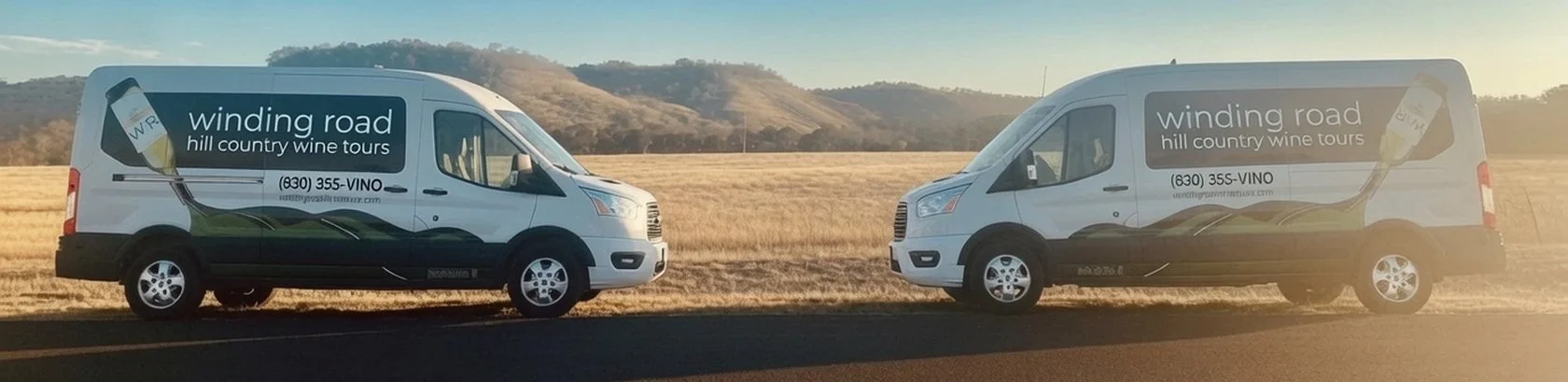Two Winding Road shuttles parked on a Hill Country road at golden hour