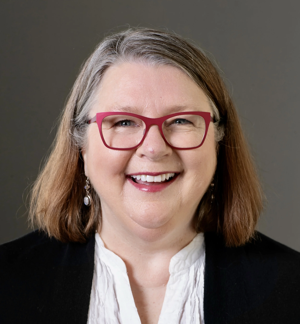 Portrait of Annie, education marketing consultant, smiling