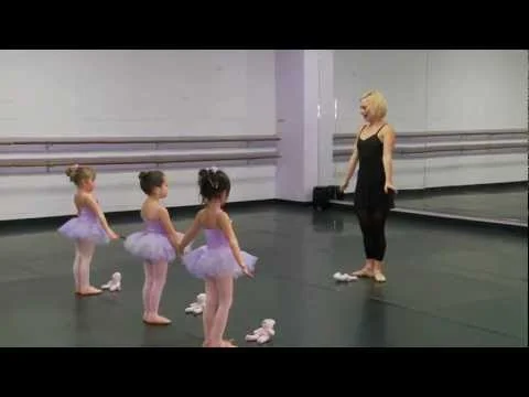 Young dancers practicing in a studio environment during a preschool dance program