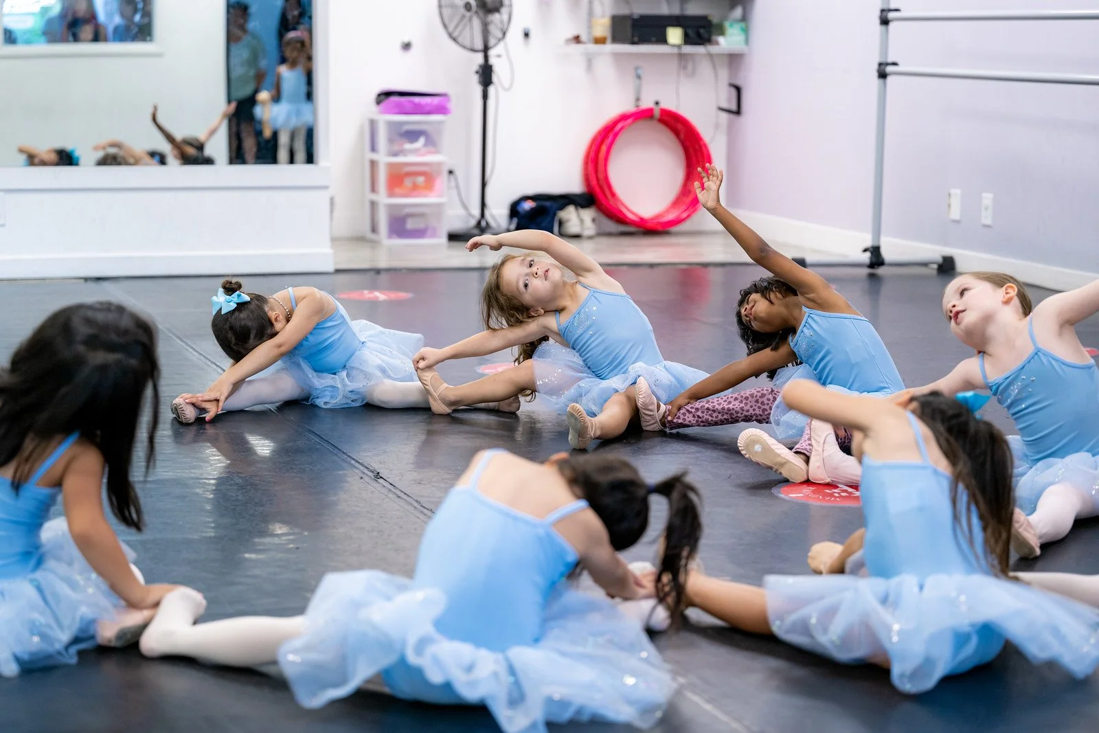 Children dancing with expressive creative movement in class