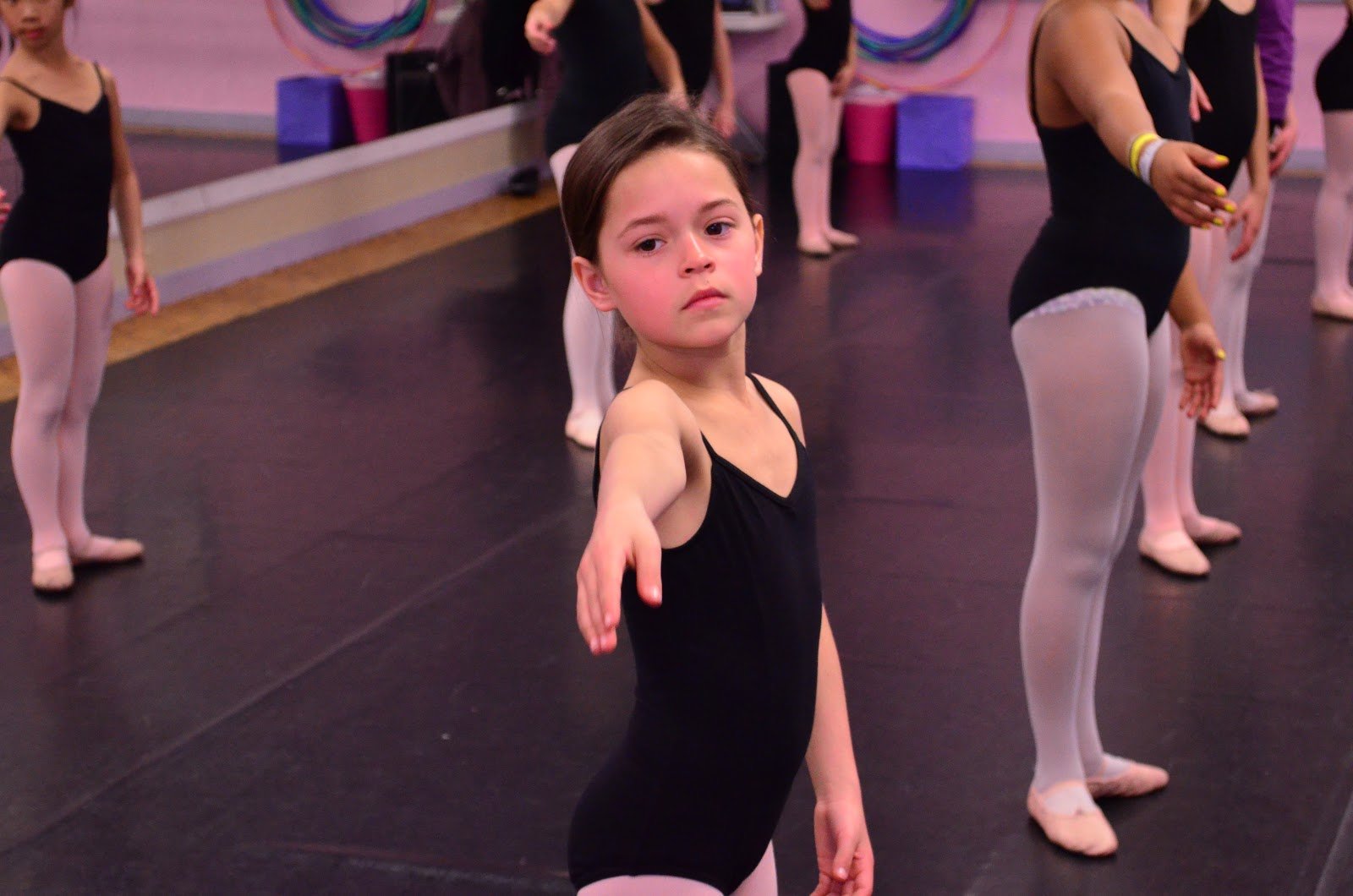 Preschool dancers enjoying a class experience that encourages long-term participation