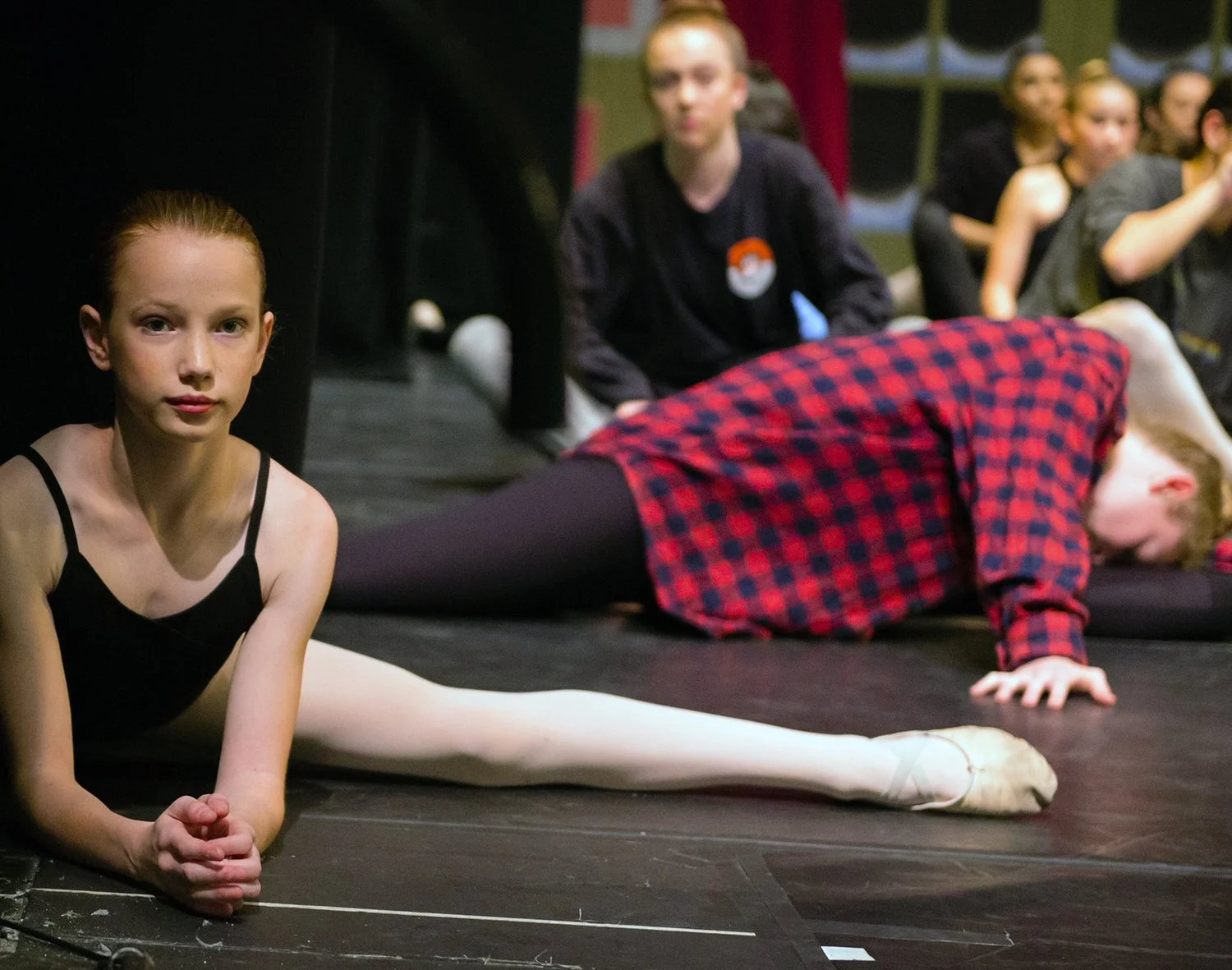 Children and instructor participating in a joyful preschool dance setting