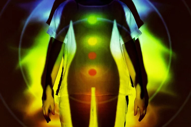 bridge with light leading into forest