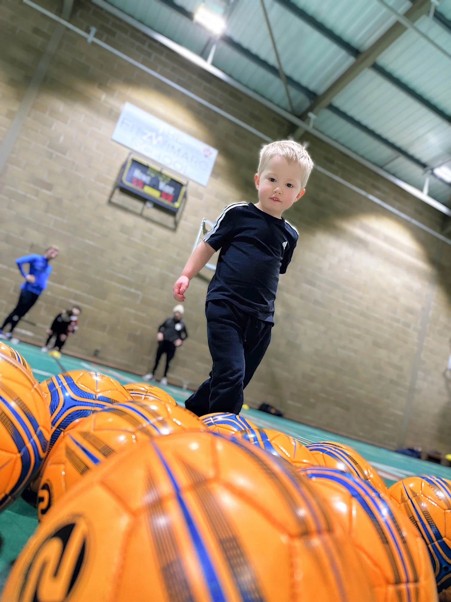 Young player enjoying an EEFC indoor session