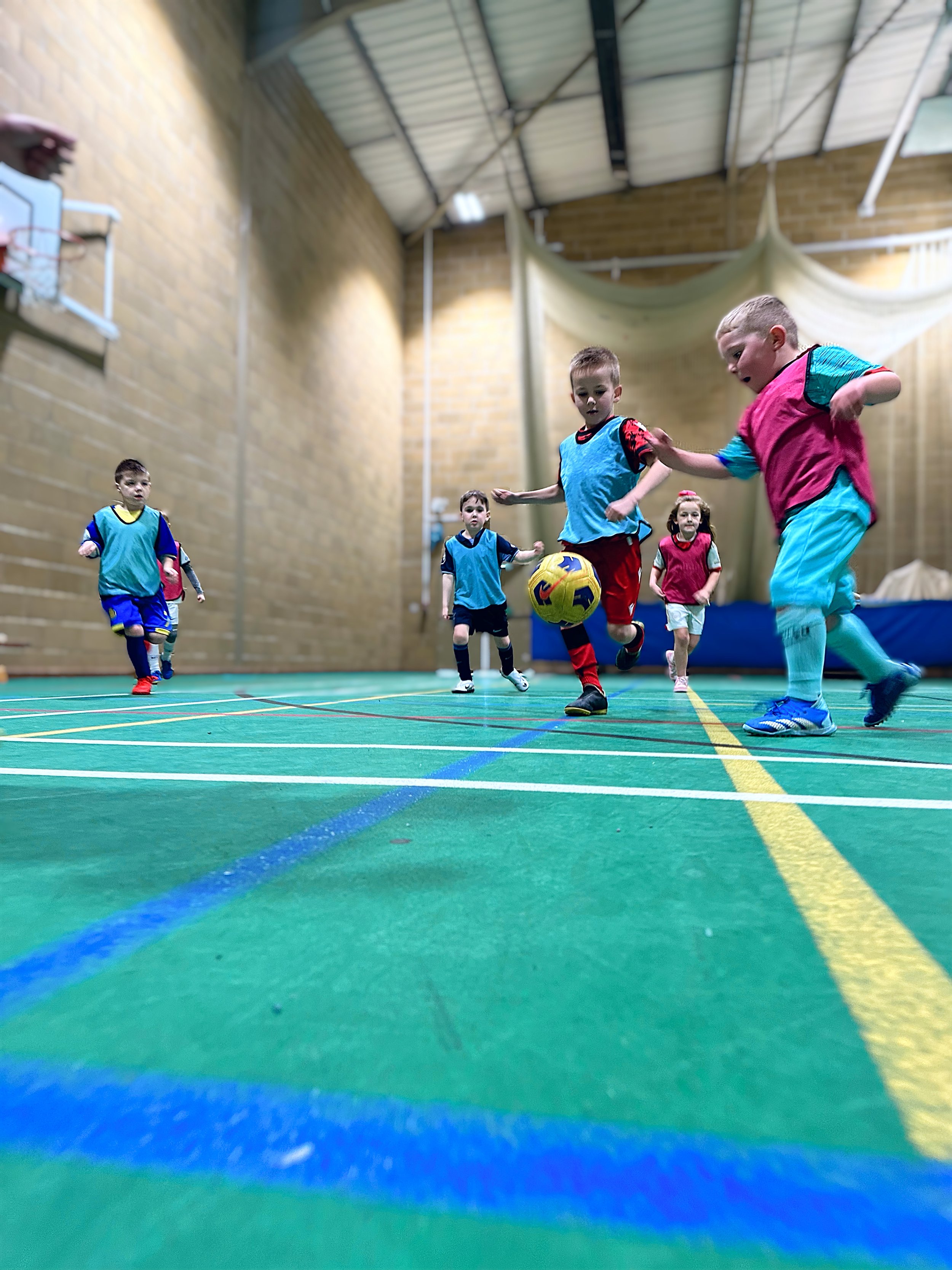 Children enjoying Saturday football coaching