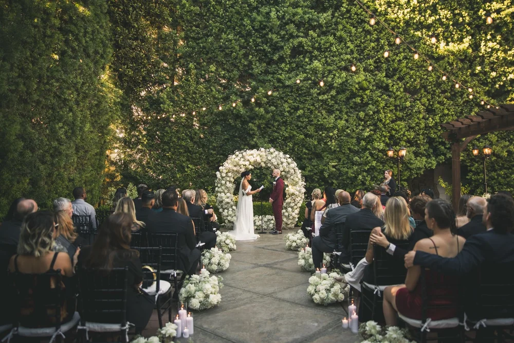 Vine-wrapped courtyard ceremony at Franciscan Gardens, San Juan Capistrano