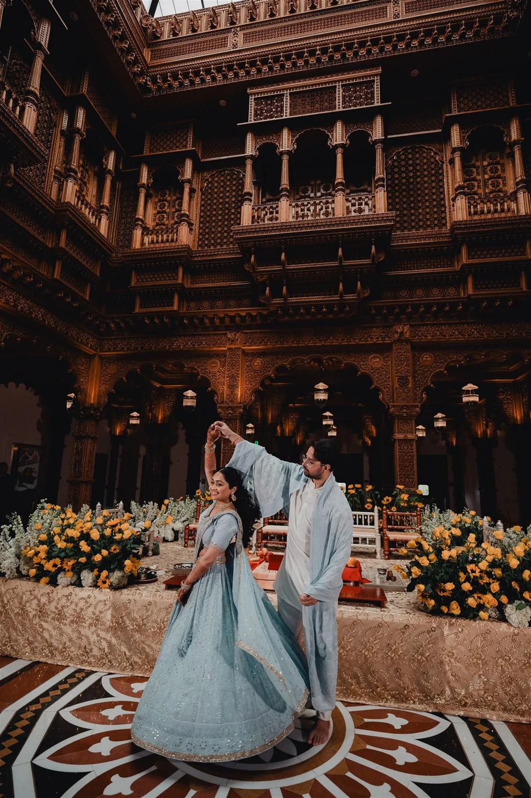 Indian wedding mandap ritual under a decorated canopy