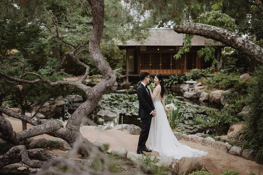 Couple portrait among the koi ponds at Storrier-Stearns Japanese Garden in Pasadena