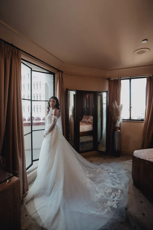A-line with illusion lace sleeves — gown 12.2 at a Los Angeles wedding