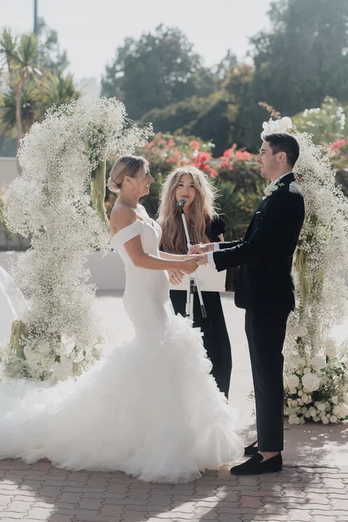 Ruffled mermaid with a cathedral train — gown 10.1 at a Los Angeles wedding