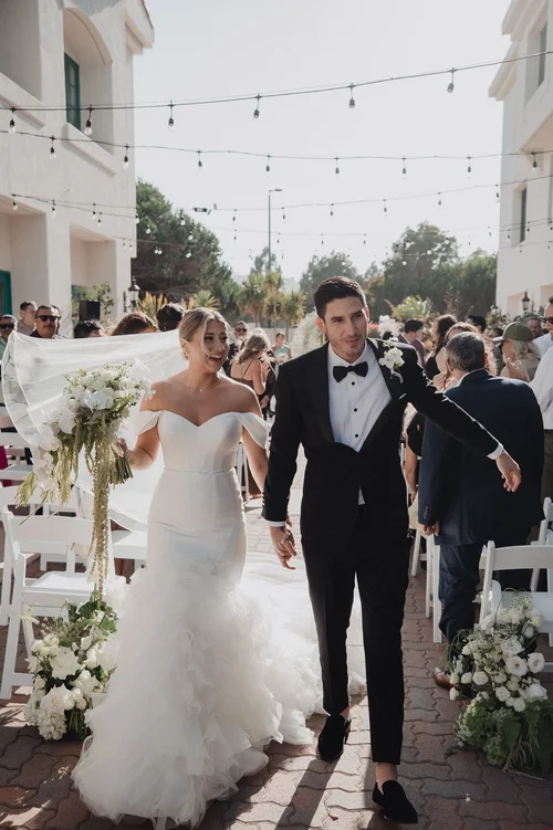 Ruffled mermaid with a cathedral train — gown 10.2 at a Los Angeles wedding