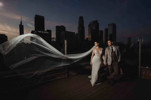 Deep-V lace with a very long veil — gown 30.0 at a Los Angeles wedding