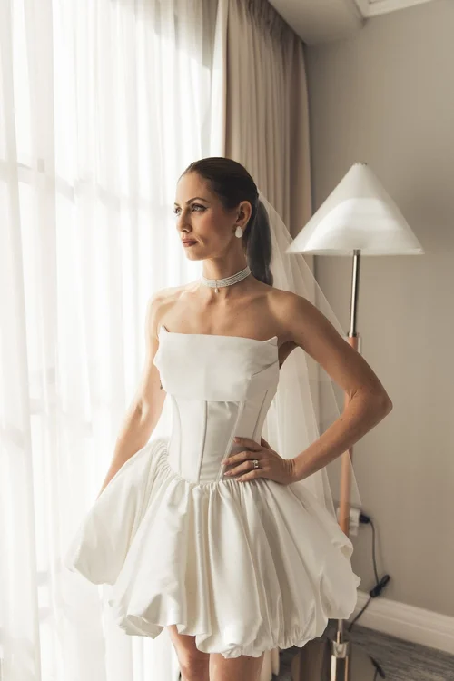Short corset dress with a bubble hem — gown 24.0 at a Los Angeles wedding
