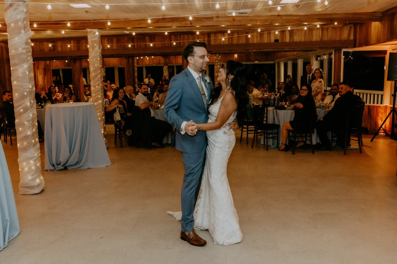 First dance in the oceanfront dining room under string lights at Duke's Malibu