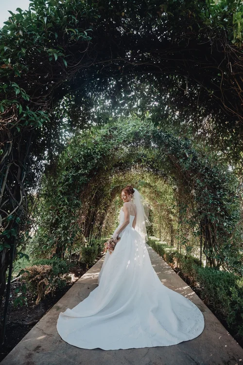 Pleated A-line with a court train — gown 19.2 at a Los Angeles wedding