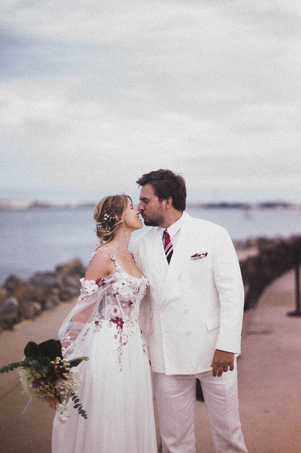 Couple photographed on Kodak Gold 200 through a Leica rangefinder at a San Diego wedding.