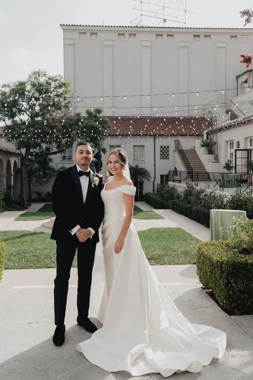 Layered silk sheath with a high slit — gown 29.0 at a Los Angeles wedding