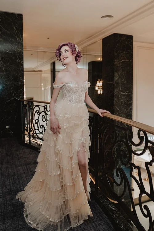 Blush ruffled gown with a high slit — gown 14.1 at a Los Angeles wedding