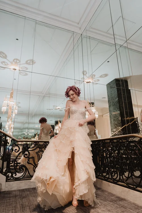 Blush ruffled gown with a high slit — gown 14.2 at a Los Angeles wedding