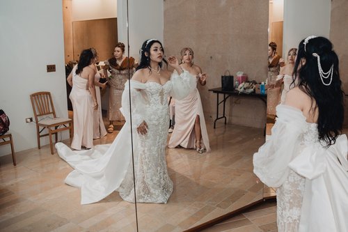 Lace with detachable off-shoulder sleeves — gown 28.0 at a Los Angeles wedding