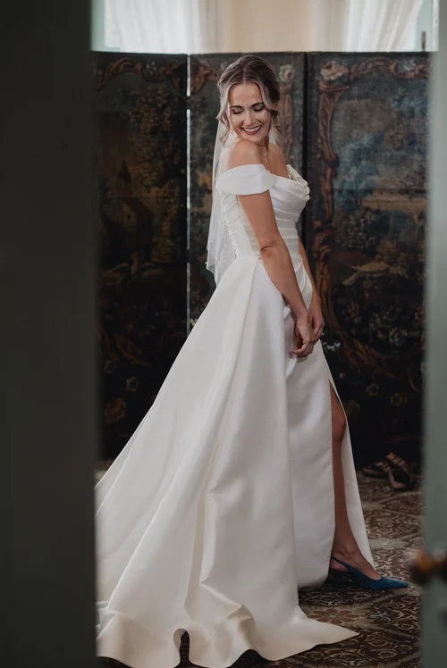 Layered silk sheath with a high slit — gown 29.1 at a Los Angeles wedding
