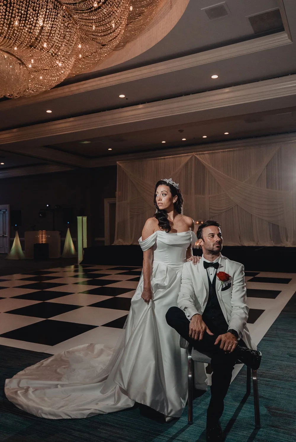 Bride and groom on the chequered ballroom dance floor at the Renaissance Newport Beach