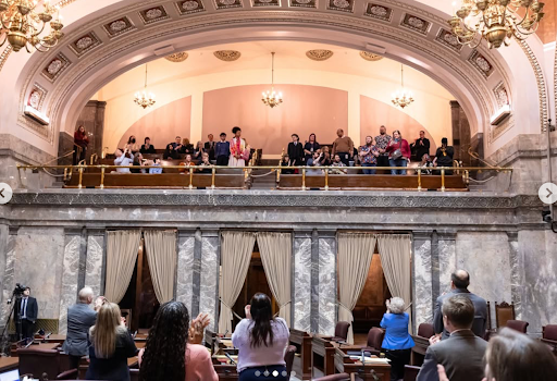 Washington State Legislature session with advocates in gallery