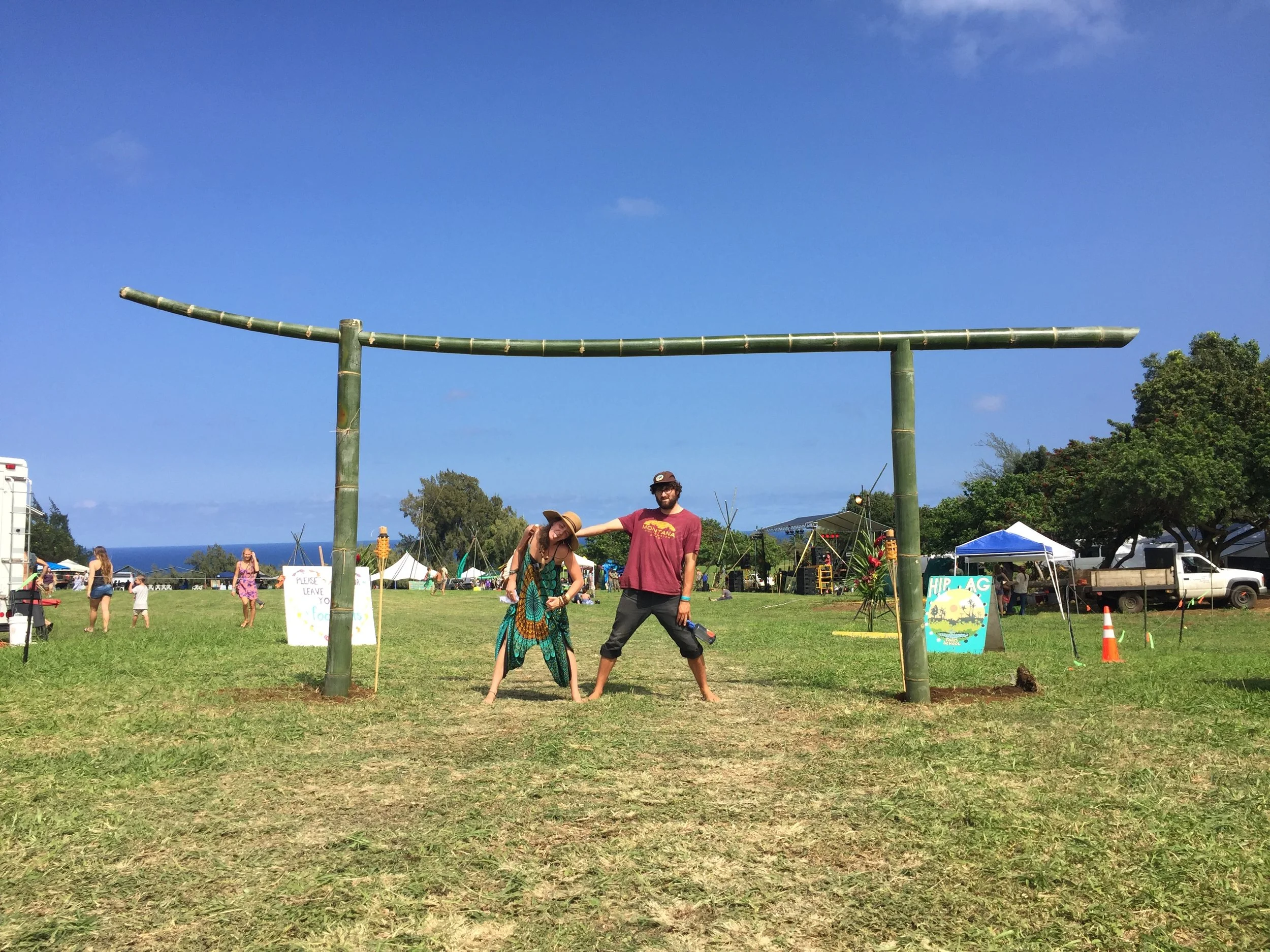 Headstand under bamboo torii gate · festival · Big Island
