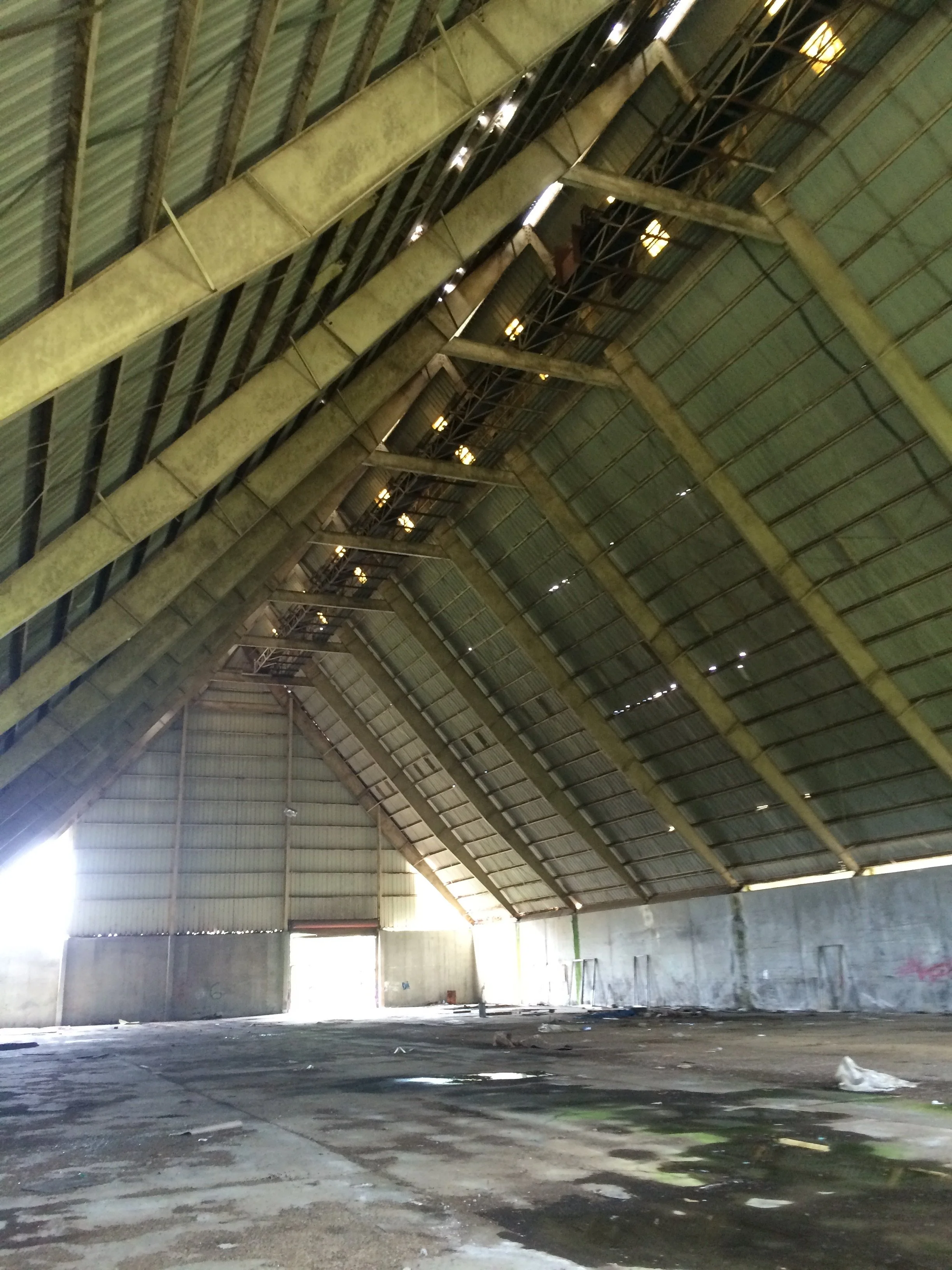 Inside the Haina Mill A-frame · cathedral scale