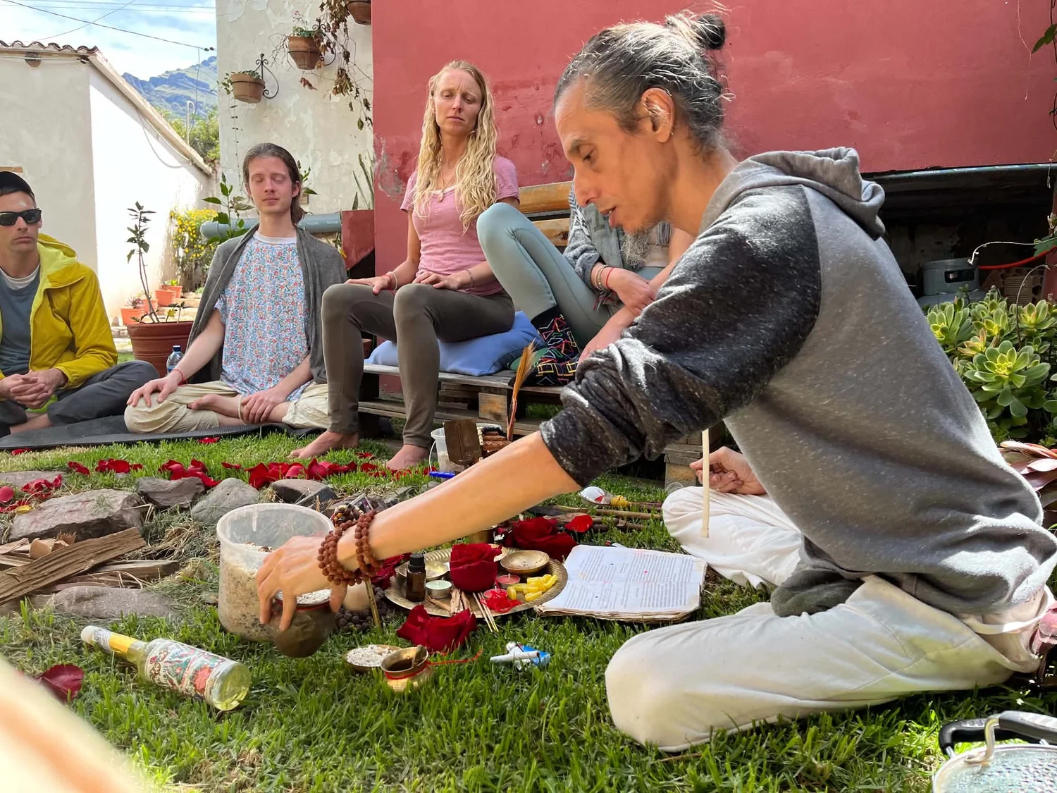 Paul Diamond leading a fire puja in the garden at Tantraya Center