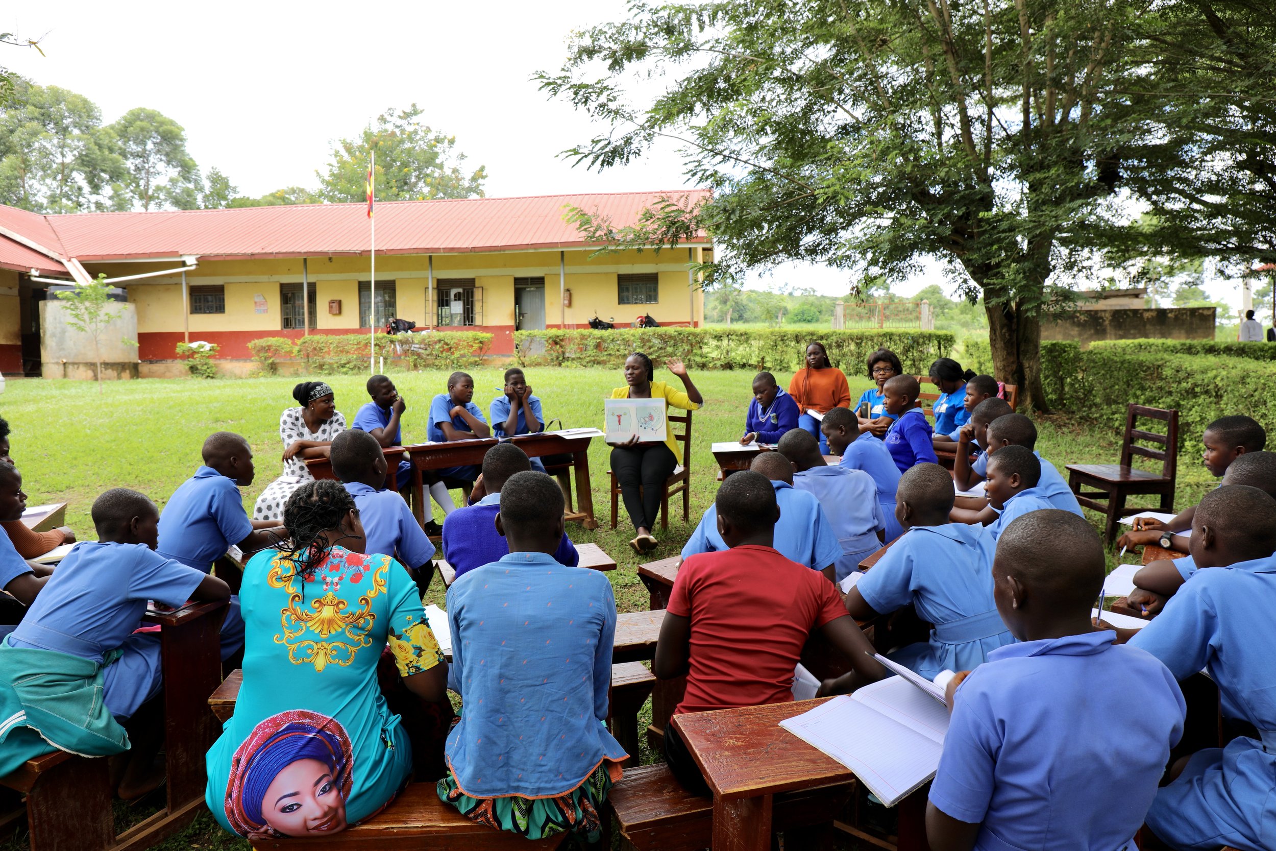 A menstrual health education session with girls and local programme leaders
