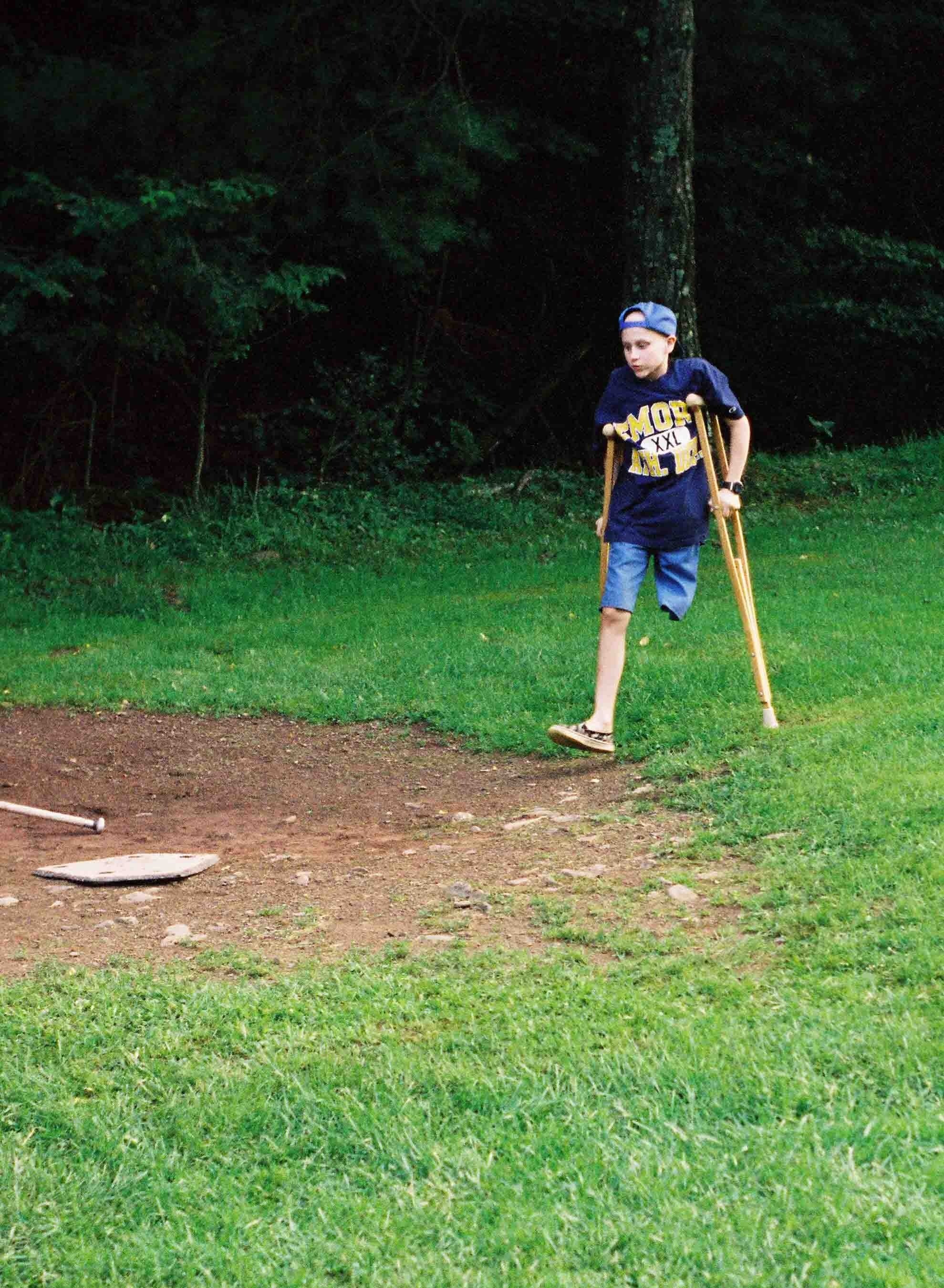 Josh playing baseball after amputation