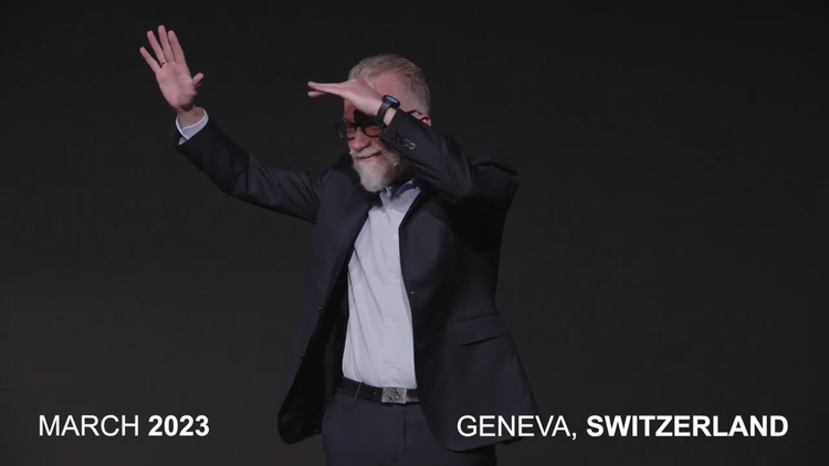 Screen shot of Pascal Bijleveld delivering his TED talk.   He has his hands over his eyes, looking out to the audience.  Text reads March 2023, Geneva, Switzerland