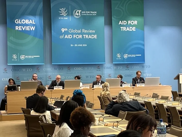 9th Global Review of Aid for trade speakers sitting on the stage 