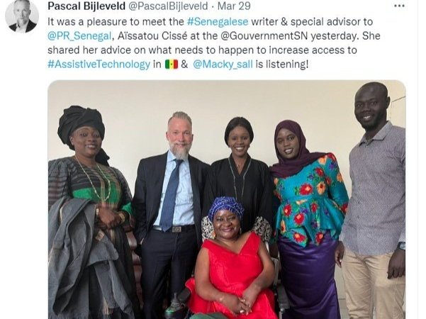 Example tweet from Pascal's Twitter feed which includes a photograph of stakeholders he met in Senegal including  the writer & special advisor to President of Senegal, Aïssatou Cissé, who is a wheelchair user.