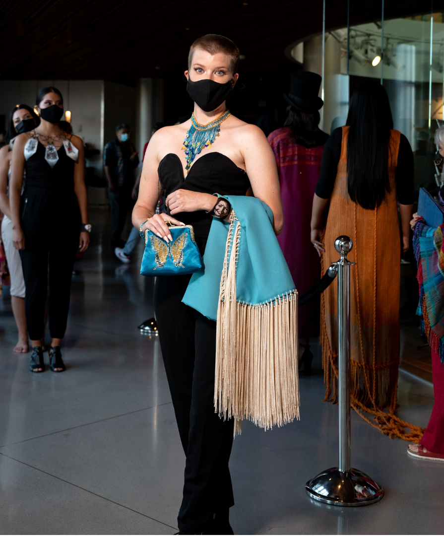 Shelby wearing beadwork at event