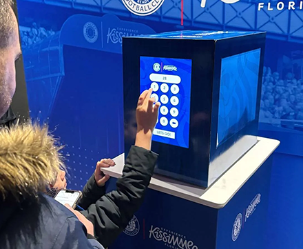 Lockbox gamification activation hire — fans solving a branded puzzle challenge at a sporting event by Social Jungle